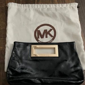 MK shiny leather hand bag
